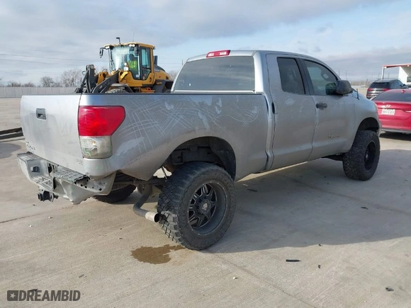 2010 Toyota Tundra 2WD Truck with VIN 5TFRM5F17AX014706, listed as a IAAI auction lot 41580313 with 209,482 mi miles. Bid and sale history available at carsss.com. Image 4.