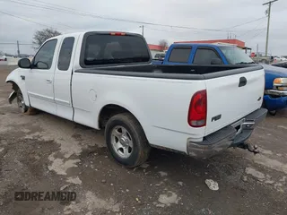 2003 Ford F-150 XL with VIN 1FTRX17W43NA31343, listed as a IAAI auction lot 41576625 with 1 mi miles. Bid and sale history available at carsss.com. Image 3.