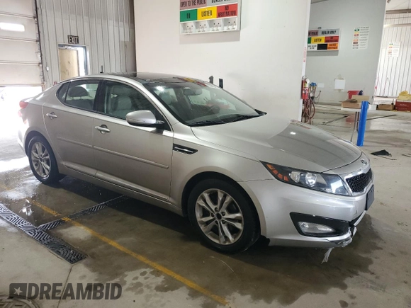 2011 Kia Optima EX z VIN KNAGN4A73B5168902, wystawiony jako Copart lot #59569365 z przebiegiem 160 297 mil mil oraz Szkoda całkowita • Salvage title. Historia ofert i sprzedaży dostępna na DreamBid. Obrazek 4.