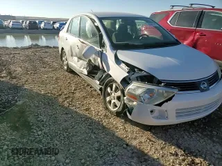 2007 Nissan Versa 1.8 SL with VIN 3N1BC11E57L414097, listed as a Copart auction lot 46945525 with 81,788 mi miles and Salvage Title. Bid and sale history available at carsss.com. Image 10.
