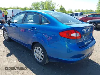 2011 Ford Fiesta SE z VIN 3FADP4BJXBM175601, wystawiony jako IAAI lot #42282031 z przebiegiem 157 658 mil mil oraz . Historia ofert i sprzedaży dostępna na DreamBid. Obrazek 3.