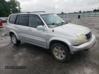 2001 Suzuki XL7 Standard z VIN JS3TX92V814116919, wystawiony jako Copart lot #72758694 z przebiegiem 185 153 mil mil oraz Szkoda całkowita • Salvage title. Historia ofert i sprzedaży dostępna na DreamBid. Obrazek 4.