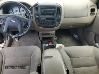 2002 Ford Escape XLT Choice z VIN 1FMYU04172KA54070, wystawiony jako Copart lot #60696405 z przebiegiem 311 796 mil mil oraz Czysty tytuł • Clean title. Historia ofert i sprzedaży dostępna na DreamBid. Obrazek 8.