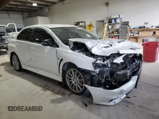 2015 Mitsubishi Lancer Evolution GSR with VIN JA32W8FV0FU016272, listed as a Copart auction lot 50517395 with 89,318 mi miles and Salvage Title. Bid and sale history available at carsss.com. Image 4.