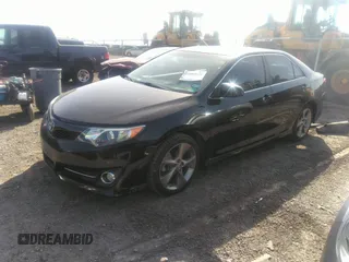 2014 Toyota Camry L with VIN 4T1BF1FKXEU397458, listed as a IAAI auction lot 41852126 with 122,075 mi miles. Bid and sale history available at carsss.com. Image 2.