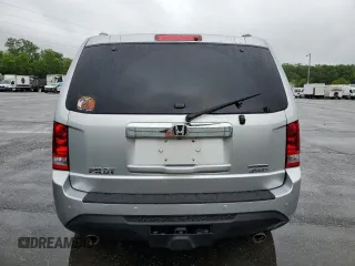2013 Honda Pilot Touring z VIN 5FNYF4H99DB083396, wystawiony jako Copart lot #58728975 z przebiegiem Nie podano mil oraz Czysty tytuł • Clean title. Historia ofert i sprzedaży dostępna na DreamBid. Obrazek 6.