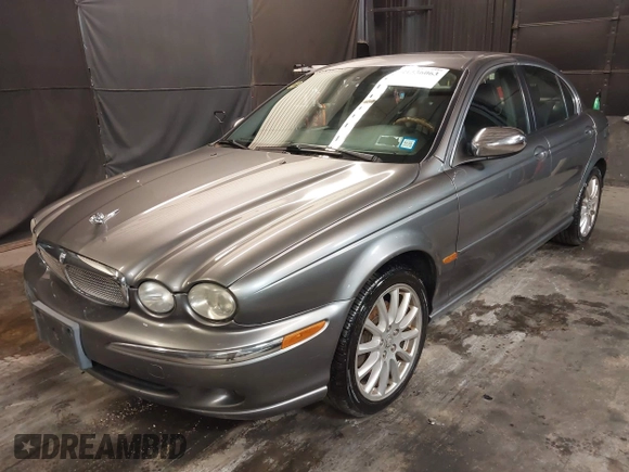 2007 Jaguar X-Type z VIN SAJWA51A37WJ17866, wystawiony jako IAAI lot #41536063 z przebiegiem 121 177 mil mil oraz . Historia ofert i sprzedaży dostępna na DreamBid. Obrazek 18.