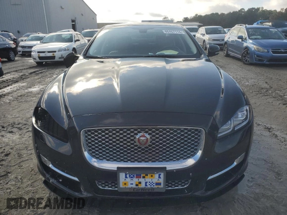 2016 Jaguar XJ Portfolio with VIN SAJWJ2GDXG8W03143, listed as a Copart auction lot 86467114 with 42,923 mi miles and Salvage title. Bid and sale history available at DreamBid. Image 5.