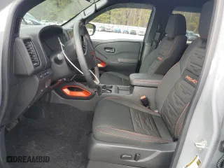 2024 Nissan Frontier PRO-4X with VIN 1N6ED1EK8RN659581, listed as a Copart auction lot 44911715 with 6,215 mi miles and Salvage Title. Bid and sale history available at carsss.com. Image 7.