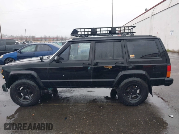 1996 Jeep Cherokee SE with VIN 1J4FJ28S9TL135564, listed as a IAAI auction lot 41618367 with 249,410 mi miles and . Bid and sale history available at DreamBid. Image 14.