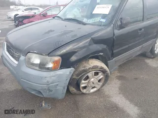 2004 Ford Escape XLT with VIN 1FMCU03114KB25567, listed as a IAAI auction lot 41559575 with 238,685 mi miles. Bid and sale history available at carsss.com. Image 6.