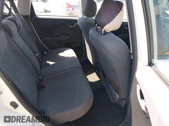 2009 Honda Fit z VIN JHMGE88239S045275, wystawiony jako IAAI lot #42142589 z przebiegiem 145 964 mil mil oraz . Historia ofert i sprzedaży dostępna na DreamBid. Obrazek 8.