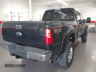 2015 Ford Super Duty F-250 SRW Lariat with VIN 1FT7W2BT1FED13599, listed as a IAAI auction lot 41987618 with 174,728 mi miles. Bid and sale history available at carsss.com. Image 4.