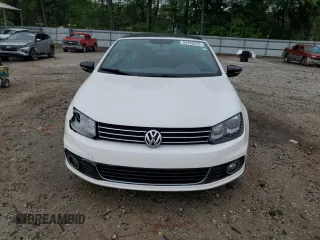 2013 Volkswagen Eos Komfort with VIN WVWBW8AH0DV003581, listed as a Copart auction lot 54498655 with 95,203 mi miles and Salvage Title. Bid and sale history available at DreamBid. Image 5.