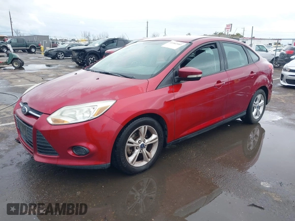 2014 Ford Focus SE with VIN 1FADP3F22EL112110, listed as a IAAI auction lot 41582585 with 107,285 mi miles. Bid and sale history available at carsss.com. Image 2.