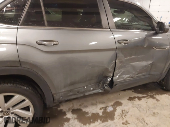 2020 Volkswagen Atlas SE with VIN 1V26E2CA9LC230374, listed as a IAAI auction lot 41336609 with 52,500 mi miles and . Bid and sale history available at DreamBid. Image 6.