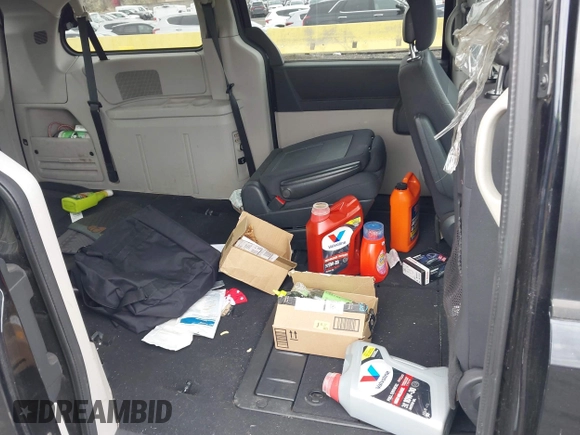2010 Dodge Grand Caravan SXT with VIN 2D4RN5D13AR426980, listed as a IAAI auction lot 42035672 with 162,584 mi miles and . Bid and sale history available at DreamBid. Image 8.