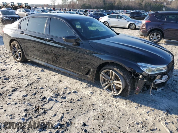2016 BMW 7 Series 750i with VIN WBA7F0C5XGGL99048, listed as a Copart auction lot 84815364 with 96,743 mi miles and Salvage Title. Bid and sale history available at carsss.com. Image 4.