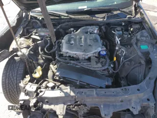 2004 Infiniti G35 w/Leather z VIN JNKCV54E94M816591, wystawiony jako Copart lot #57841935 z przebiegiem 176 606 mil mil oraz Szkoda całkowita • Salvage title. Historia ofert i sprzedaży dostępna na DreamBid. Obrazek 11.