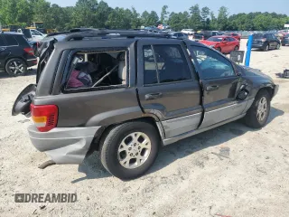 1999 Jeep Grand Cherokee Laredo с VIN 1J4G258S9XC758711, выставлен на аукционе Copart как лот 58420835 с пробегом Не указан миль и Списание • Salvage title. История ставок и продаж доступна на DreamBid. Изображение 3.