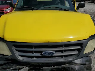 2003 Ford F-150 XL z VIN 2FTRX18W53CA92348, wystawiony jako Copart lot #56222285 z przebiegiem 266 068 mil mil oraz Szkoda całkowita • Salvage title. Historia ofert i sprzedaży dostępna na DreamBid. Obrazek 11.