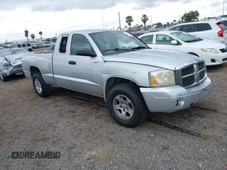 2007 Dodge Dakota SLT with VIN 1D7HE42K97S126808, listed as a IAAI auction lot 42189660 with 232,109 mi miles and . Bid and sale history available at DreamBid. Image 1.