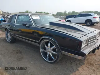 1984 Chevrolet Monte Carlo z VIN 1G1AZ37H9ER201513, wystawiony jako IAAI lot #42416804 z przebiegiem 80 467 mil mil oraz . Historia ofert i sprzedaży dostępna na DreamBid. Obrazek 1.