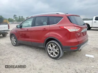 2015 Ford Escape Titanium z VIN 1FMCU9J94FUB09903, wystawiony jako Copart lot #59922275 z przebiegiem 132 243 mil mil oraz Czysty tytuł • Clean title. Historia ofert i sprzedaży dostępna na DreamBid. Obrazek 2.