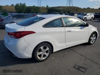 2013 Hyundai Elantra Coupe GS PZEV with VIN KMHDH6AE6DU001610, listed as a Copart auction lot 71978914 with 105,932 mi miles and Salvage Title. Bid and sale history available at carsss.com. Image 3.