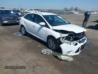 2012 Ford Focus SE with VIN 1FAHP3F20CL473141, listed as a IAAI auction lot 41776178 with 112,777 mi miles and . Bid and sale history available at DreamBid. Image 1.