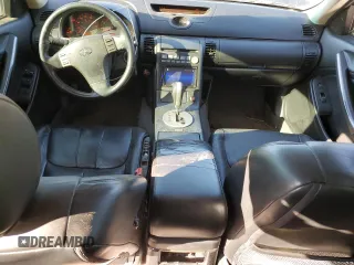 2003 Infiniti G35 w/Leather with VIN JNKCV51E83M016075, listed as a Copart auction lot 84657544 with 196,858 mi miles and Salvage Title. Bid and sale history available at DreamBid. Image 8.