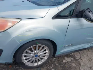 2013 Ford C-Max SE z VIN 1FADP5AU4DL511362, wystawiony jako IAAI lot #42073682 z przebiegiem 160 960 mil mil oraz . Historia ofert i sprzedaży dostępna na DreamBid. Obrazek 12.