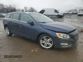 2015 Volvo V60 T5 Drive-E Premier z VIN YV140MEK9F1233763, wystawiony jako Copart lot #45242415 z przebiegiem 97 916 mil mil oraz Szkoda całkowita • Salvage title. Historia ofert i sprzedaży dostępna na DreamBid. Obrazek 4.