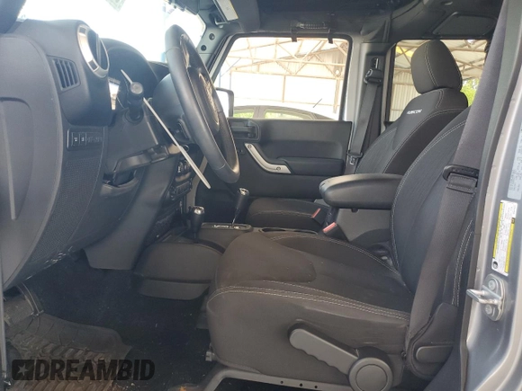 2017 Jeep Wrangler Unlimited Rubicon with VIN 1C4BJWFG4HL677477, listed as a Copart auction lot 57758175 with 89,584 mi miles and Salvage title. Bid and sale history available at DreamBid. Image 7.