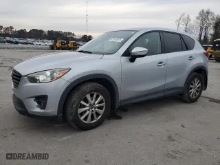 2016 Mazda CX-5 Touring with VIN JM3KE2CY1G0884474, listed as a Copart auction lot 41910975 with 106,120 mi miles and Salvage Title. Bid and sale history available at carsss.com. Image 1.