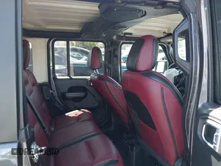 2020 Jeep Wrangler Unlimited Freedom z VIN 1C4HJXDG8LW338702, wystawiony jako IAAI lot #42006692 z przebiegiem 48 389 mil mil oraz . Historia ofert i sprzedaży dostępna na DreamBid. Obrazek 8.