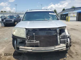 2009 Honda Pilot LX with VIN 5FNYF48259B040040, listed as a Copart auction lot 59860445 with 213,459 mi miles and Salvage title. Bid and sale history available at DreamBid. Image 5.