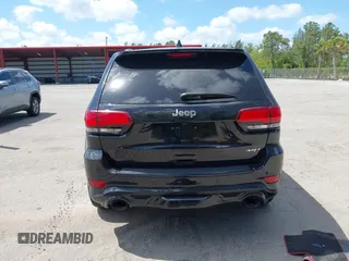2017 Jeep Grand Cherokee SRT z VIN 1C4RJFDJ8HC653924, wystawiony jako IAAI lot #42108099 z przebiegiem 61 560 mil mil oraz . Historia ofert i sprzedaży dostępna na DreamBid. Obrazek 16.