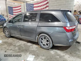 2012 Honda Odyssey EX-L with VIN 5FNRL5H64CB099092, listed as a Copart auction lot 42124784 with 247,535 mi miles and Non Repairable. Bid and sale history available at carsss.com. Image 2.