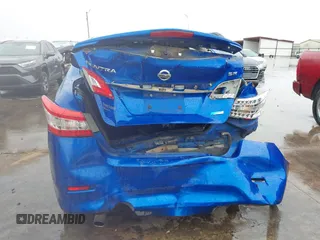 2013 Nissan Sentra S with VIN 3N1AB7AP2DL719233, listed as a IAAI auction lot 41891238 with 143,441 mi miles and . Bid and sale history available at DreamBid. Image 6.