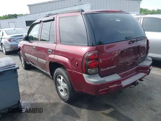 2004 Chevrolet TrailBlazer LS with VIN 1GNDT13S442394308, listed as a IAAI auction lot 42091473 with 214,669 mi miles and . Bid and sale history available at DreamBid. Image 3.