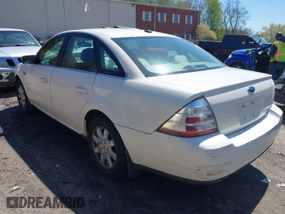2009 Ford Taurus SE with VIN 1FAHP23W89G113022, listed as a IAAI auction lot 42118187 with 135,319 mi miles. Bid and sale history available at carsss.com. Image 3.