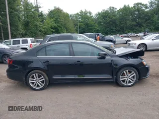 2017 Volkswagen Jetta SEL z VIN 3VWL17AJ1HM406515, wystawiony jako IAAI lot #42660560 z przebiegiem 88 253 mil mil oraz . Historia ofert i sprzedaży dostępna na DreamBid. Obrazek 13.
