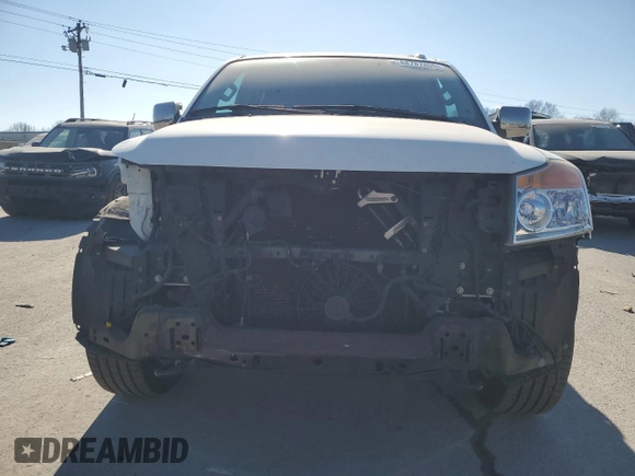 2015 Nissan Armada Platinum z VIN 5N1BA0NE1FN621958, wystawiony jako Copart lot #88787805 z przebiegiem 132 873 mil mil oraz Szkoda całkowita • Salvage title. Historia ofert i sprzedaży dostępna na DreamBid. Obrazek 5.