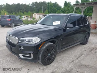 2017 BMW X5 xDrive40e iPerformance with VIN 5UXKT0C30H0V95867, listed as a IAAI auction lot 42122827 with 84,271 mi miles. Bid and sale history available at carsss.com. Image 2.