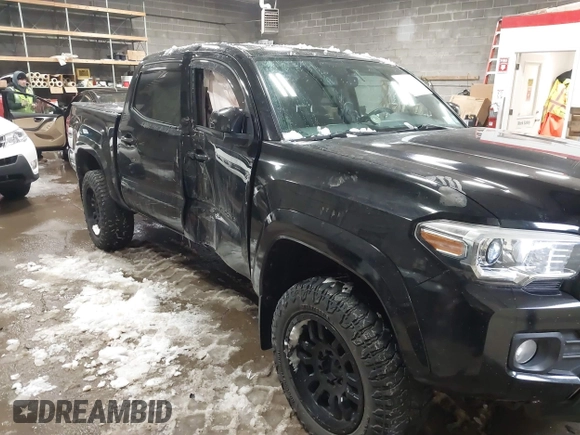 2016 Toyota Tacoma SR with VIN 3TMCZ5AN5GM037336, listed as a IAAI auction lot 41599492 with 76,262 mi miles. Bid and sale history available at carsss.com. Image 6.