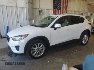 2015 Mazda CX-5 Grand Touring with VIN JM3KE4DY5F0538016, listed as a Copart auction lot 52396685 with 137,272 mi miles and Clean Title. Bid and sale history available at carsss.com. Image 1.