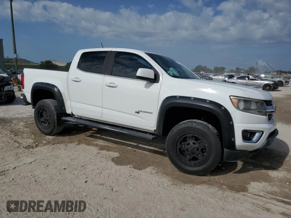 2017 Chevrolet Colorado 2WD LT with VIN 1GCGSCEA7H1232614, listed as a Copart auction lot 52377035 with 96,941 mi miles and Salvage title. Bid and sale history available at DreamBid. Image 4.
