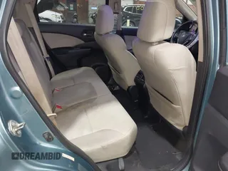 2015 Honda CR-V EX with VIN 2HKRM4H57FH614090, listed as a IAAI auction lot 41940788 with 334,805 mi miles and . Bid and sale history available at DreamBid. Image 8.