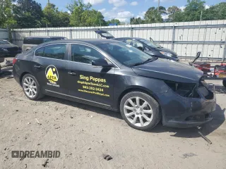 2012 Buick LaCrosse Touring with VIN 1G4GJ5E35CF323193, listed as a Copart auction lot 53535615 with 104,129 mi miles and Salvage title. Bid and sale history available at DreamBid. Image 4.